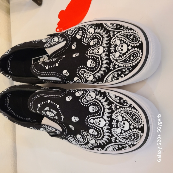 Vans Black and White Slip-On Sneakers - Picture 2 of 8